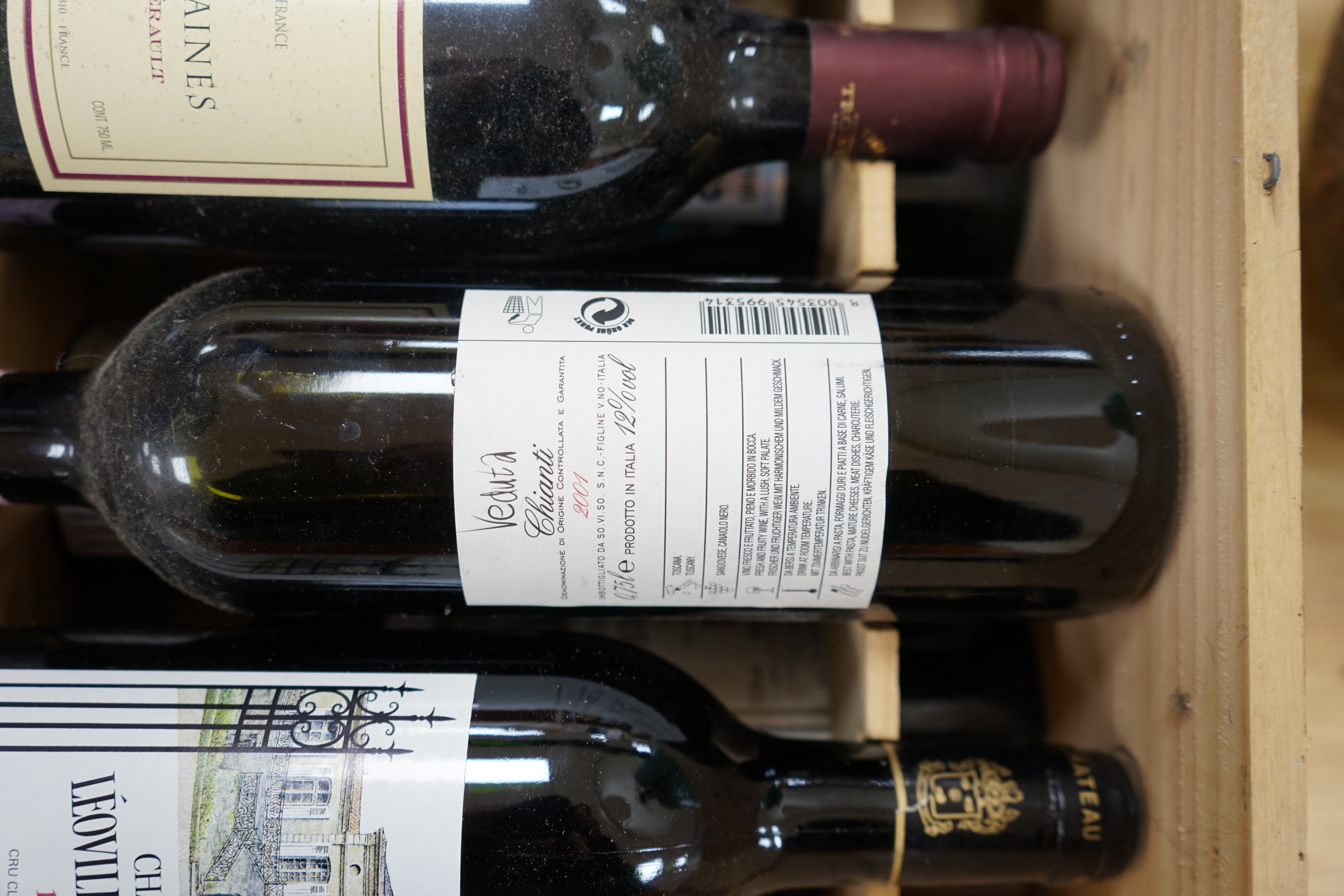 Ten bottles of mixed red wine to include three Château Leoville Barton 1992, in an open crate. Condition - fair to good, storage history unknown.